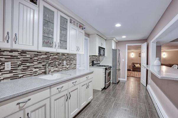 Interior, Kitchen, Recessed Lighting, Stainless Steel Appliances, Wood Texture Flooring