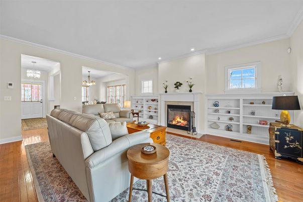 Chandelier, Fireplace, Interior, Living room, Recessed Lighting, Wood Texture Flooring
