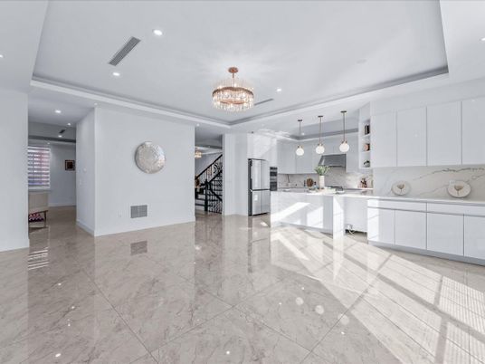 Chandelier, Interior, Kitchen, Marble, Marble Walls, Pendant Lights, Recessed Lighting, Stainless Steel Appliances