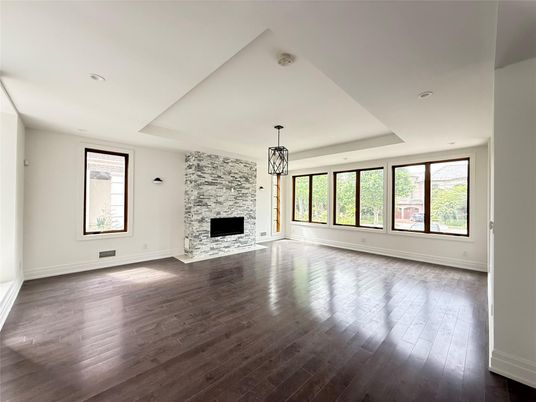 Empty room, Fireplace, Interior, Pendant Lights, Recessed Lighting, Stone Walls, Wood Texture Flooring