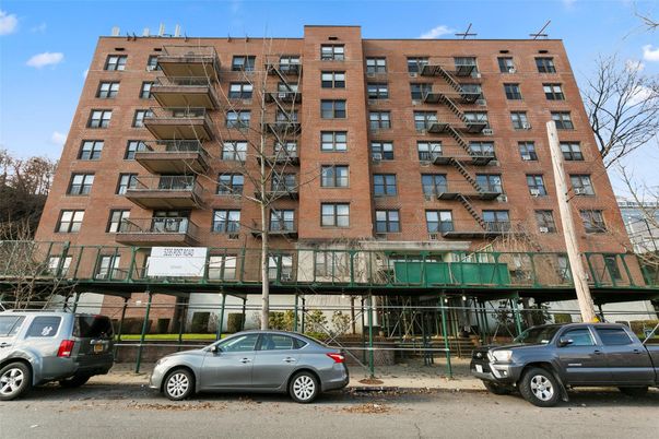 Exterior, Facade, Brick Facade, Condo Building
