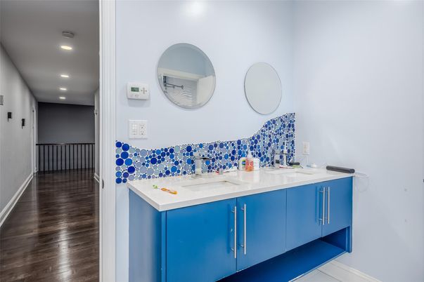 Bathroom, Dual Sink Vanities, Interior, Recessed Lighting, Wood Texture Flooring