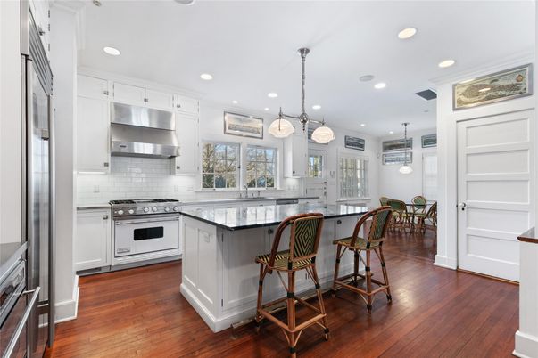 Dining room, Interior, Kitchen, Pendant Lights, Recessed Lighting, Stainless Steel Appliances, Wood Texture Flooring