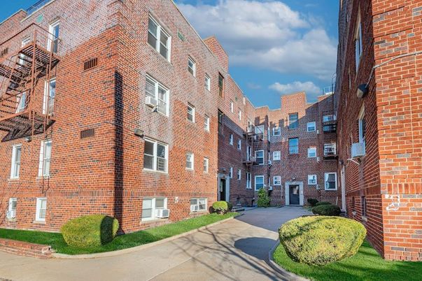 Exterior, Facade, Brick Facade, Condo Building