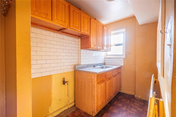 Interior, Kitchen, Tile Countertops, Wood Texture Flooring