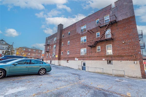 Exterior, Facade, Brick Facade, Condo Building