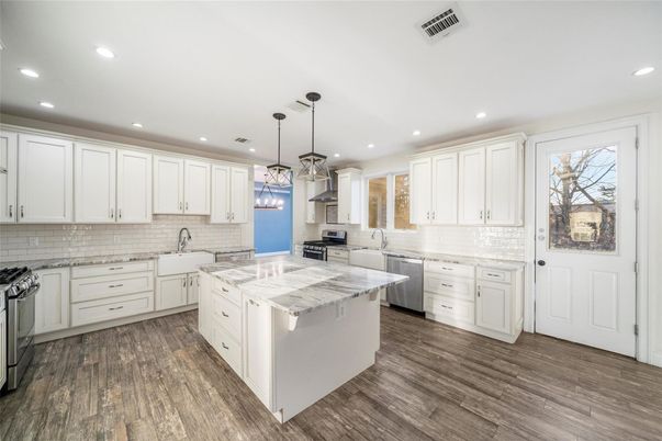 Interior, Kitchen, Pendant Lights, Recessed Lighting, Stainless Steel Appliances, Wood Texture Flooring