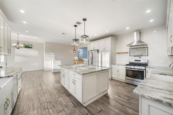 Chandelier, Interior, Kitchen, Pendant Lights, Recessed Lighting, Stainless Steel Appliances, Wood Texture Flooring