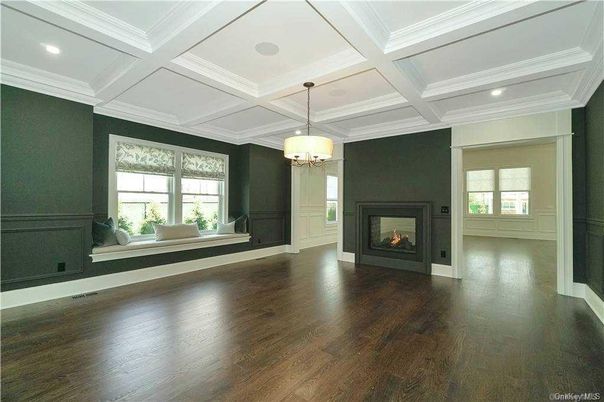 Empty room, Fireplace, Interior, Pendant Lights, Recessed Lighting, Wood Texture Flooring