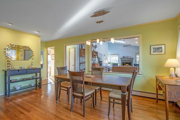 Dining room, Fireplace, Interior, Pendant Lights, Recessed Lighting, Wood Texture Flooring