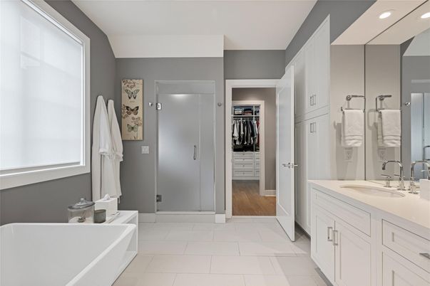 Bathroom, Dual Sink Vanities, Free Standing Baths, Interior, Recessed Lighting, Walk-in Closets, Wood Texture Flooring