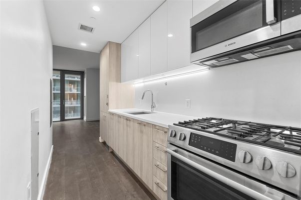 Interior, Kitchen, Recessed Lighting, Stainless Steel Appliances, Wood Texture Flooring