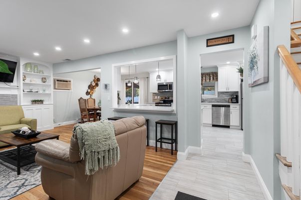 Dining room, Interior, Kitchen, Living room, Pendant Lights, Recessed Lighting, Stainless Steel Appliances, Wood Texture Flooring