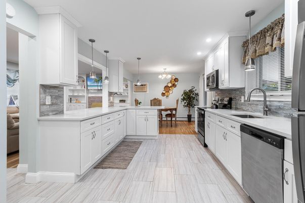Dining room, Interior, Kitchen, Pendant Lights, Recessed Lighting, Stainless Steel Appliances, Wood Texture Flooring