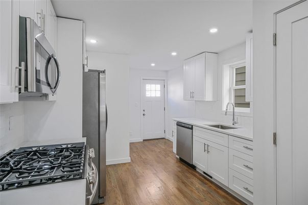 Interior, Kitchen, Recessed Lighting, Stainless Steel Appliances, Wood Texture Flooring