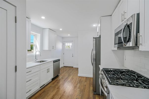 Interior, Kitchen, Recessed Lighting, Stainless Steel Appliances, Wood Texture Flooring