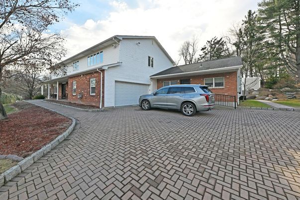 Attached, Exterior, Facade, Brick Facade, Cape Cod