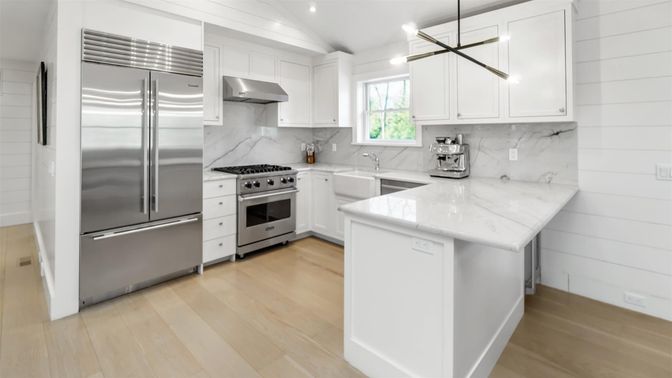 Interior, Kitchen, Marble Walls, Pendant Lights, Recessed Lighting, Stainless Steel Appliances, Wood Texture Flooring