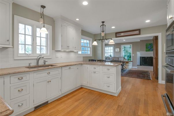 Dining room, Fireplace, Interior, Kitchen, Pendant Lights, Recessed Lighting, Wood Texture Flooring