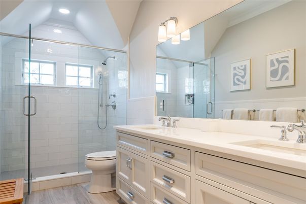 Bathroom, Dual Sink Vanities, Glass Shower, Interior, Recessed Lighting, Wood Texture Flooring