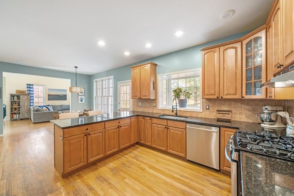 Dining room, Interior, Kitchen, Living room, Pendant Lights, Recessed Lighting, Stainless Steel Appliances, Wood Texture Flooring