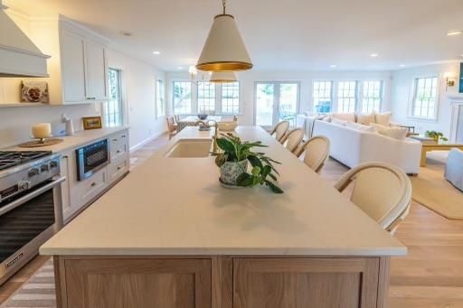 Dining room, Interior, Kitchen, Living room, Pendant Lights, Recessed Lighting, Stainless Steel Appliances, Wood Texture Flooring