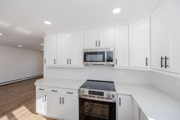 Interior, Kitchen, Recessed Lighting, Stainless Steel Appliances, Wood Texture Flooring