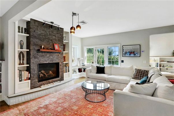 Fireplace, Interior, Living room, Pendant Lights, Stone Walls, Wood Texture Flooring