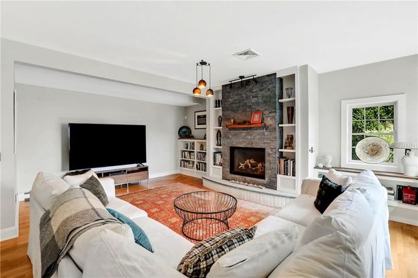 Fireplace, Interior, Living room, Pendant Lights, Stone Walls, Wood Texture Flooring