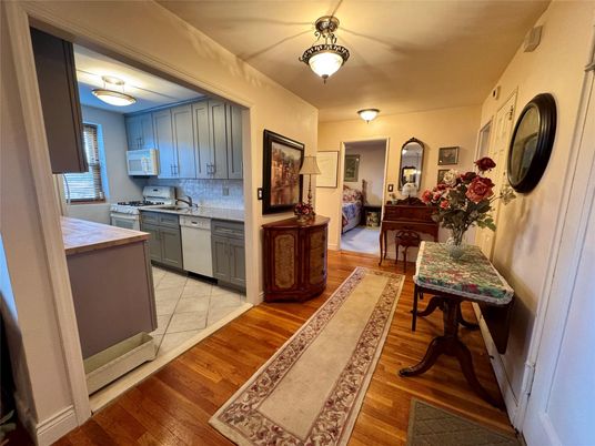 Interior, Kitchen, Tile Countertops, Wood Texture Flooring