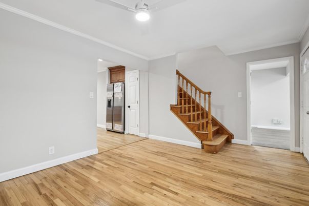 Empty room, Interior, Recessed Lighting, Stainless Steel Appliances, Wood Texture Flooring
