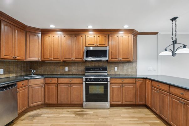Interior, Kitchen, Pendant Lights, Recessed Lighting, Stainless Steel Appliances, Wood Texture Flooring
