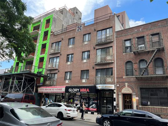 Exterior, Facade, Brick Facade, Condo Building
