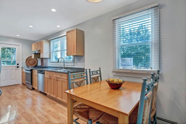 Dining room, Interior, Kitchen, Recessed Lighting, Stainless Steel Appliances, Wood Texture Flooring