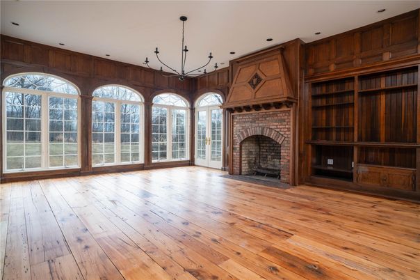 Chandelier, Empty room, Fireplace, Interior, Recessed Lighting, Wood Texture Flooring