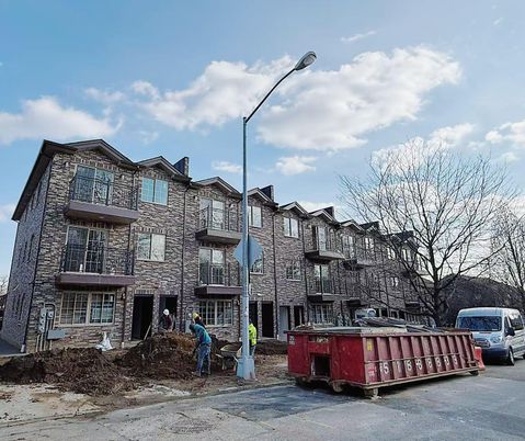 Exterior, Facade, Brick Facade, Condo Building