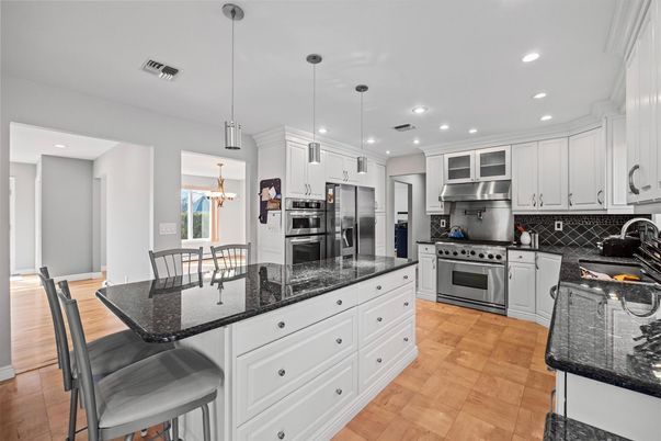Dining room, Interior, Kitchen, Pendant Lights, Recessed Lighting, Stainless Steel Appliances, Wood Texture Flooring