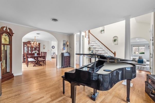 Chandelier, Dining room, Interior, Piano, Wood Texture Flooring