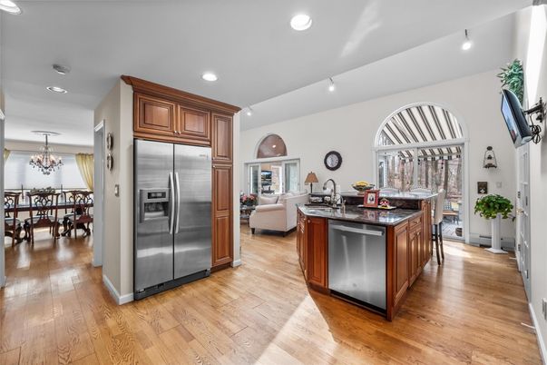 Chandelier, Dining room, Interior, Kitchen, Living room, Recessed Lighting, Stainless Steel Appliances, Wood Texture Flooring