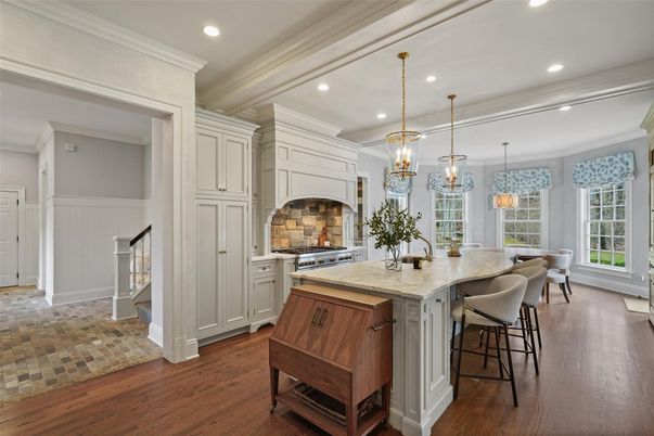Chandelier, Dining room, Interior, Kitchen, Pendant Lights, Recessed Lighting, Stainless Steel Appliances, Wood Texture Flooring