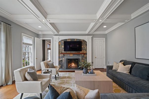 Fireplace, Interior, Living room, Recessed Lighting, Stone Walls, Wood Texture Flooring