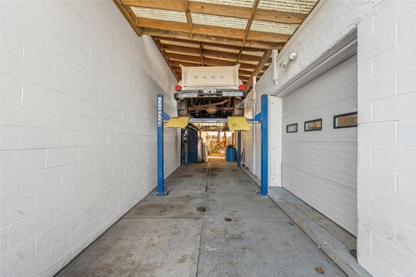 Garage, Interior, Stone Walls, Wooden Beams