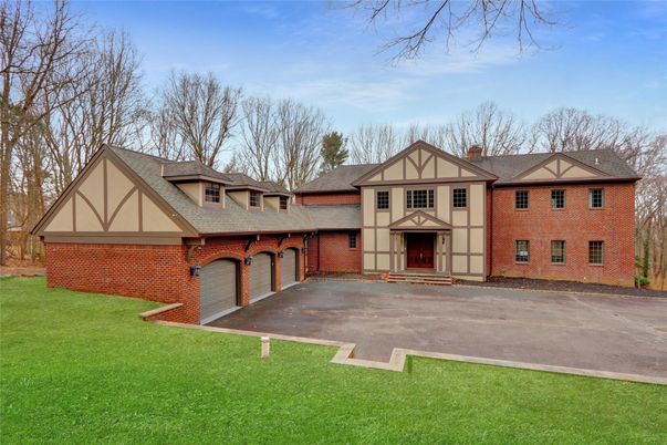 Attached, Backyard, Exterior, Facade, Brick Facade, Tudor Revival