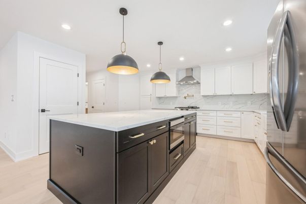 Interior, Kitchen, Marble Walls, Pendant Lights, Recessed Lighting, Stainless Steel Appliances, Wood Texture Flooring