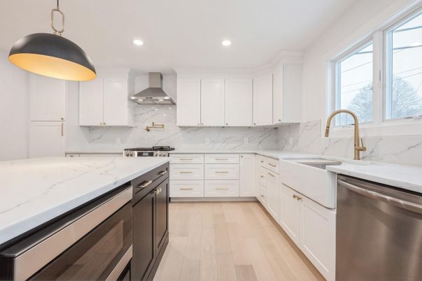Interior, Kitchen, Marble Walls, Pendant Lights, Recessed Lighting, Stainless Steel Appliances, Wood Texture Flooring