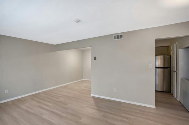 Empty room, Interior, Kitchen, Stainless Steel Appliances, Wood Texture Flooring