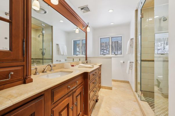 Bathroom, Dual Sink Vanities, Glass Shower, Interior, Recessed Lighting, Tile Countertops