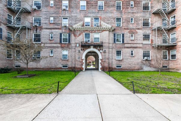 Exterior, Facade, Brick Facade, Condo Building