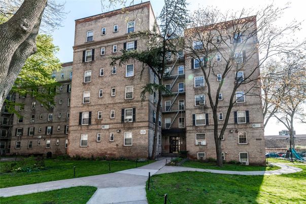Backyard, Exterior, Facade, Brick Facade, Playground, Condo Building