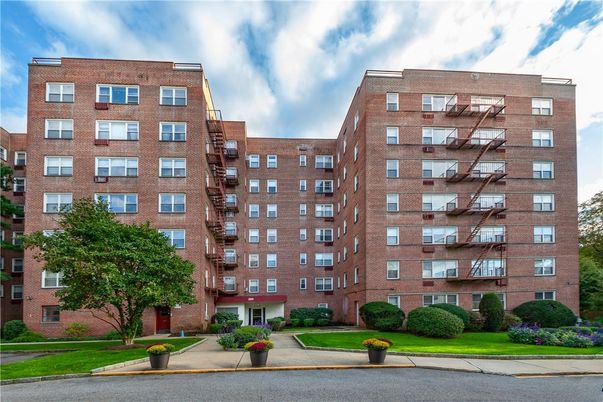 Exterior, Facade, Brick Facade, Condo Building